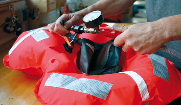 Service check for inflated lifejackets